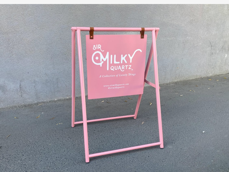 Double-sided A-frame sidewalk sign is a portable and stylish announcement board for cafes, restaurants, and boutique stores. Both sides can be printed or left blank, allowing you to convey your message in both directions. Known as a ‘storefront A-frame sign’ and ‘sidewalk sandwich sign.’

